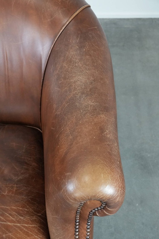 Image 1 of cognac kleurige vintage rundleren clubfauteuil in Engelse stijl 