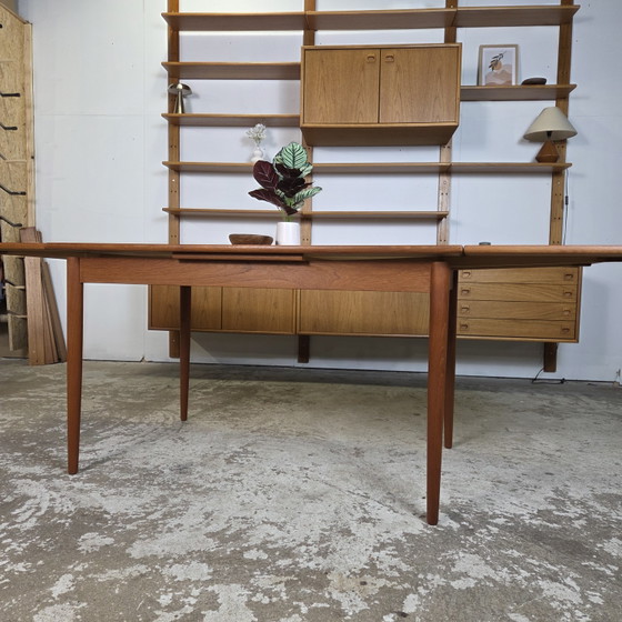 Image 1 of Vintage jaren 60 verlengbare Deense eettafel teak topstaat!