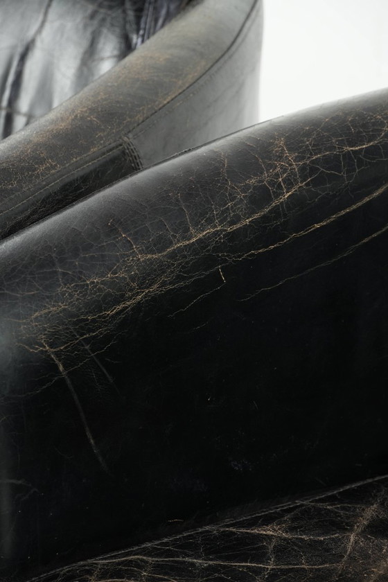 Image 1 of 2x rugged black vintage cowhide Aviator design armchairs with a distinctive look