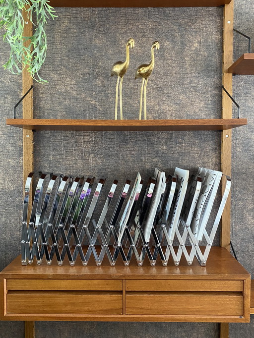 Harmonica chrome magazine rack Luther Evans Radius Design