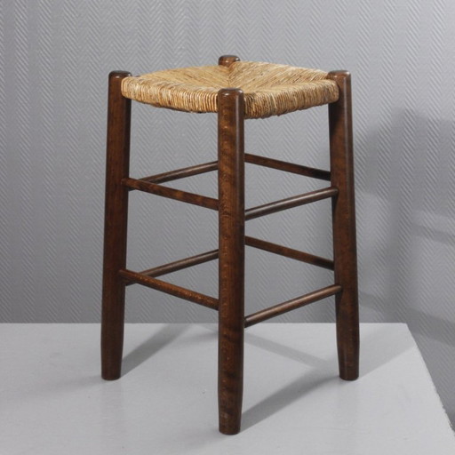 Vintage rieten kruk, in de stijl van Charlotte Perriand, jaren 70.