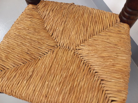 Image 1 of Vintage Charles Dudouyt Brutalist lage stoel in hout en stro uit de jaren 40