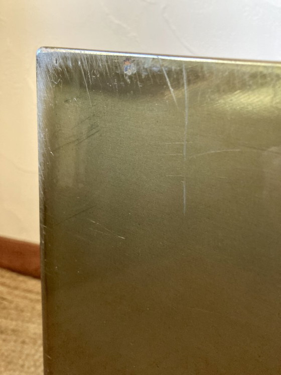 Image 1 of Electro-galvanized metal seat, brass effect. Pharrell Williams / Louis Vuitton fashion show, 2024