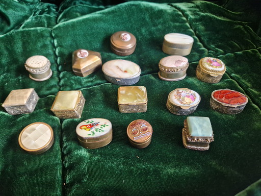 Collection of 16 pill boxes