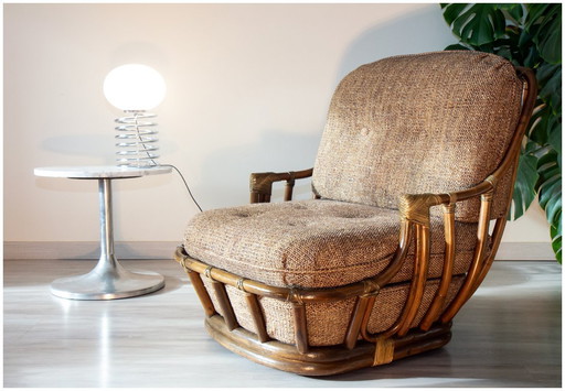 Poltrona bassa anni '80, lana e rattan, girevole
