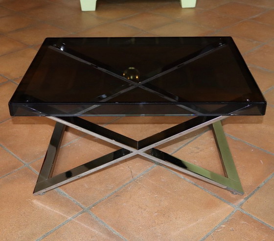 Image 1 of Aster X salontafel van gepolijst verchroomd aluminium en rookglas.