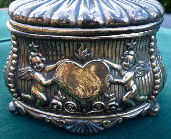Image 1 of Old jewelry box with putti holding a heart!!