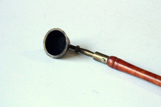 Image 1 of Candle snuffer from the 1950s, wood/brass