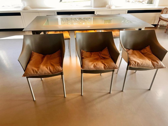 Image 1 of Mesa de comedor y 6 sillas de diseño de Philippe Starck.