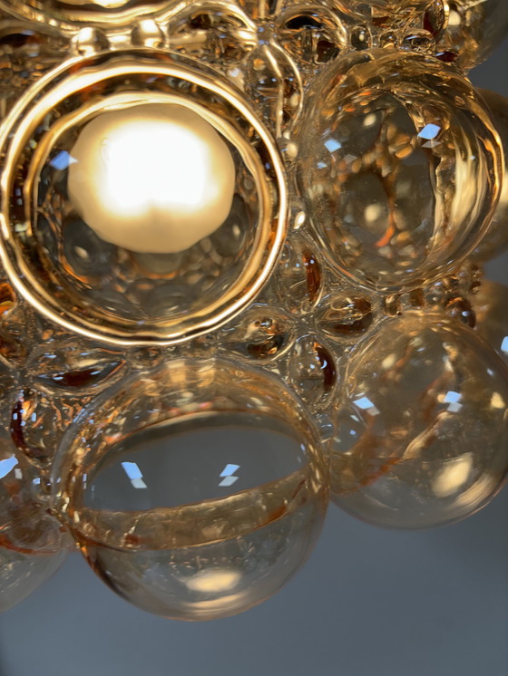 Image 1 of Exclusieve Limburg Helena Tynell “Bubble Lamp” – Amber / goud kleurig glas