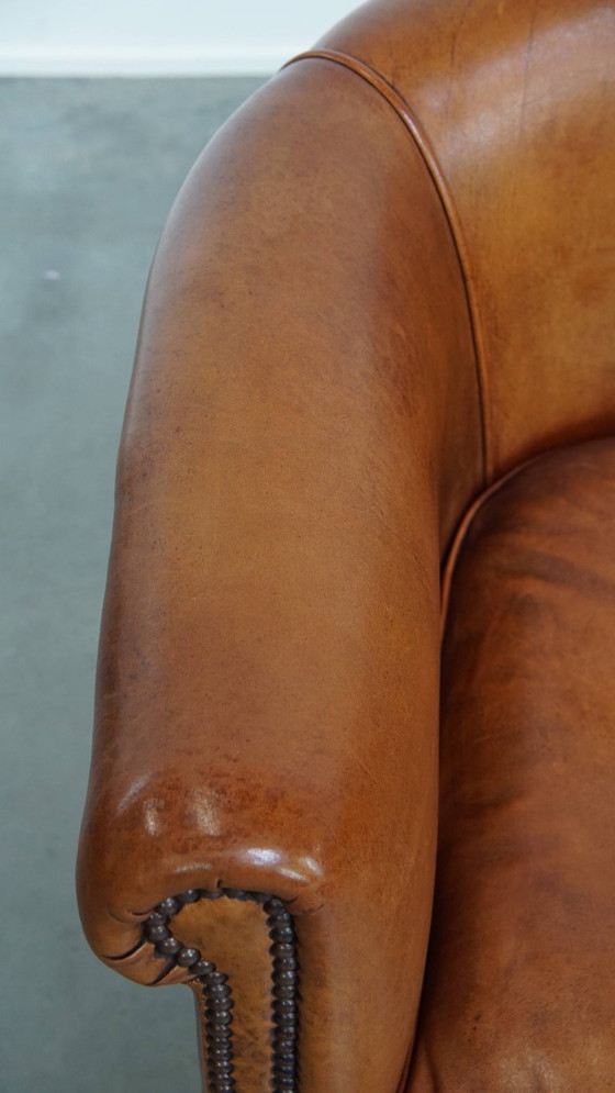 Image 1 of In goede staat verkerende schapenleren clubfauteuil