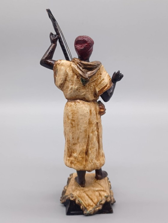 Image 1 of Ecole Orientaliste du XXème siècle, Musicien de rue en métal belle patine