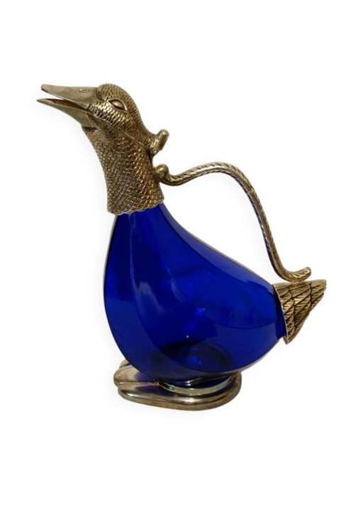 Caraffa zoomorfa in vetro e metallo argentato, XX secolo 