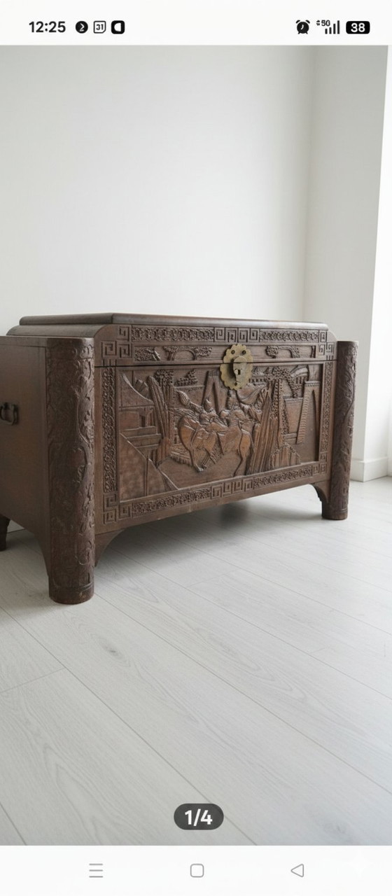 Image 1 of Antique Chinese chest with deep wood carving