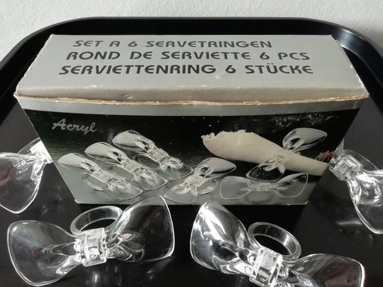 Image 1 of Anelli per tovaglioli in acrilico e papillon