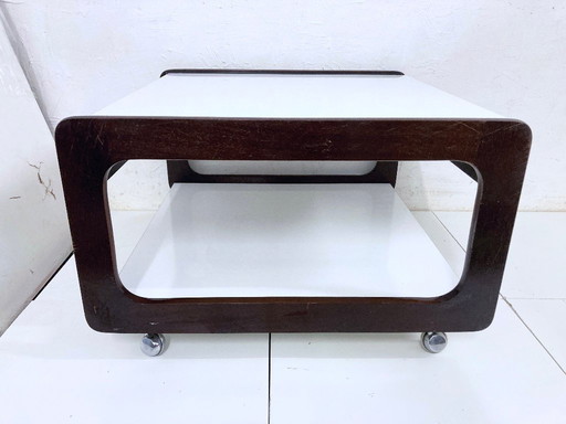 Extendable coffee table on wheels from the 1970s Space Age design