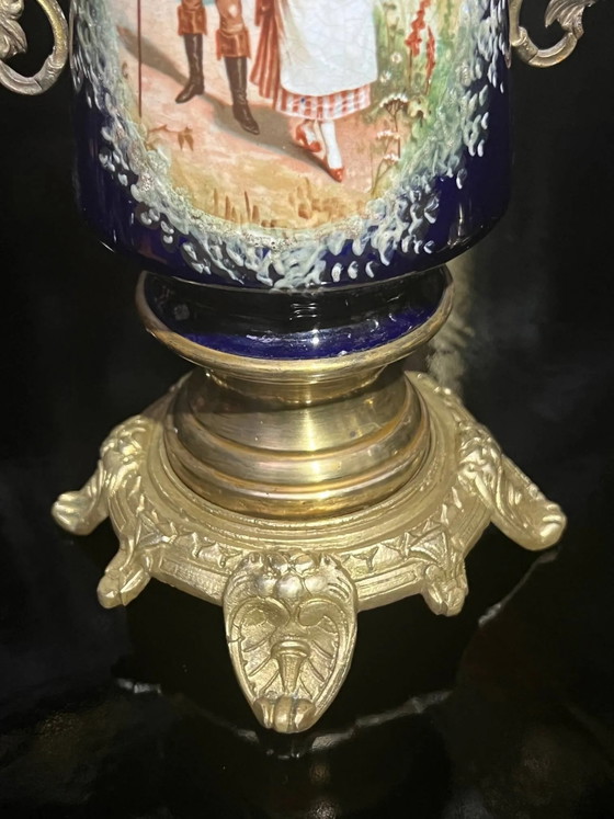 Paire de chandeliers. Bronze, laiton, porcelaine. – Bougeoirs et chandeliers (photo 4 of 7)