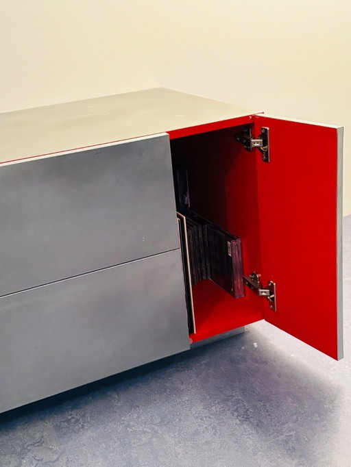 CAST zinc with red art Arno Kortschot cd cabinet