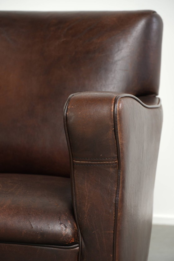 Fauteuil Subtil Foncé Vintage En Cuir De Mouton Avec Coussin Fixe Et Design Intemporel – Leather, Klassiek (photo 10 of 12)