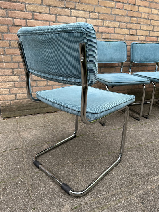 Image 1 of 4 Stühle mit geripptem Stoffbezug und verchromtem Rohrgestell