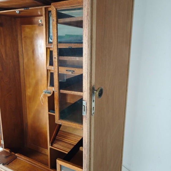 Image 1 of Men's wardrobe from the 1920s by Compactom Ltd in light oak.