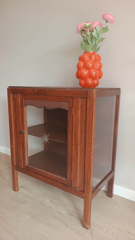 Image 1 of Bellissima vetrina in stile Art Déco della scuola di Amsterdam.