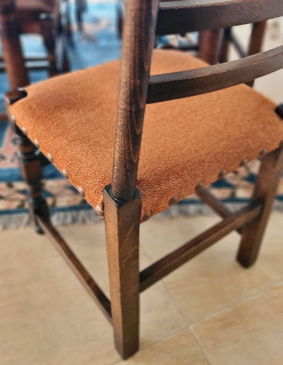 Image 1 of Massief eikenhouten eettafel met 6 bijpassende stoelen 