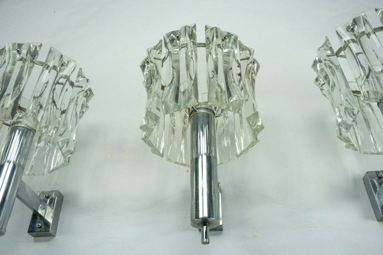 Image 1 of Ensemble de quatre grandes appliques en verre de Murano et en laiton chromé, Italie, années 1960.