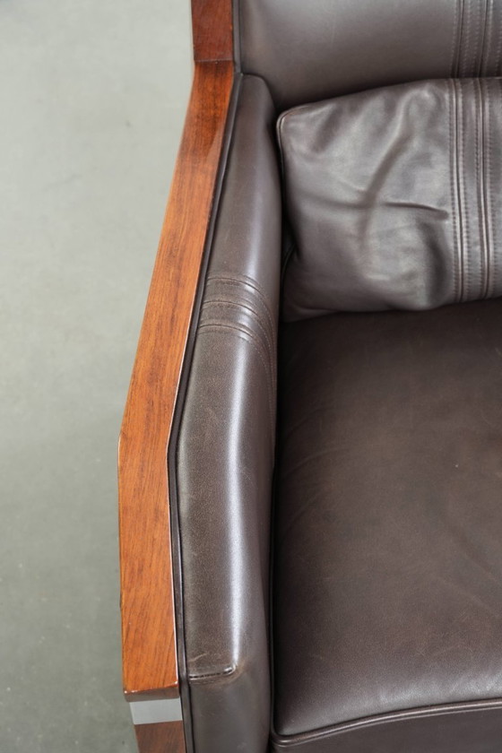 Image 1 of Luxe Schuitema Art Deco design set bestaande uit een fauteuil en hocker uit de Decoforma serie in chocolade bruin rundleer