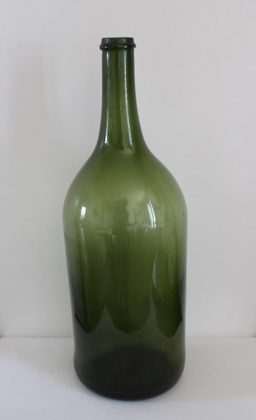 Antique magnum bottle in hand-blown glass