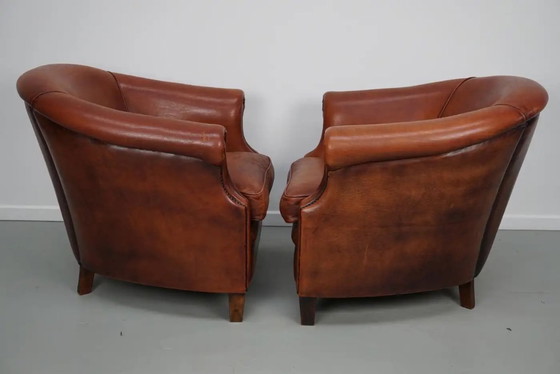 Image 1 of Vintage Nederlandse clubfauteuils in cognackleurig leer, set van 2