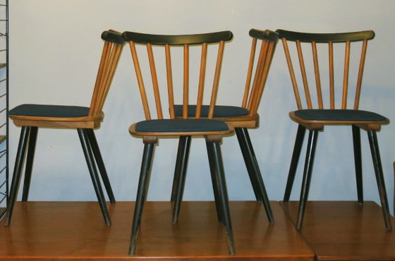 Set van 4 eetkamerstoelen in mid-century stijl met uitlopende poten en marineblauwe zittingen. – Textile (photo 6 of 11)