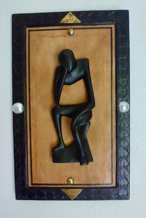 Wandpaneel met abstracte 3-D interpretatie van "De Denker”.