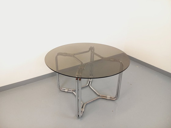 Image 1 of Round vintage dining table in smoked glass and chromed metal in the Space Age style of the 70s