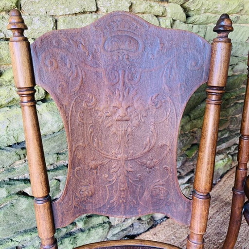 Pair of 2 chairs with relief pattern