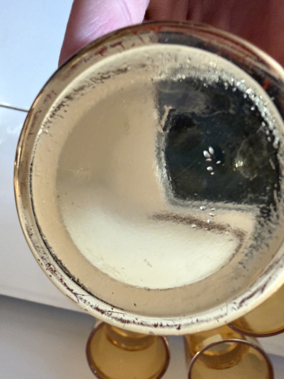 Image 1 of Set van 4 amberkleurige glazen met goudkleurige band