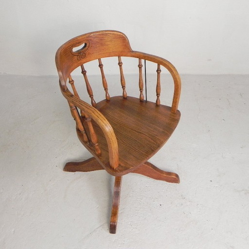 Silla de oficina de roble con sistema de muelles y altura regulable, década de 1930.