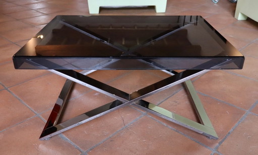 Aster X salontafel van gepolijst verchroomd aluminium en rookglas.