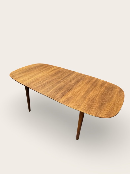 Extendable oval dining table - teak/walnut - A.A. Patijn for Zijlstra, 1950s