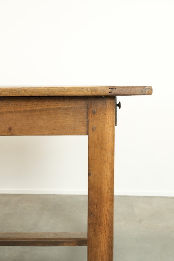 Image 1 of Large antique French farmhouse dining table made of oak from the early 1800s