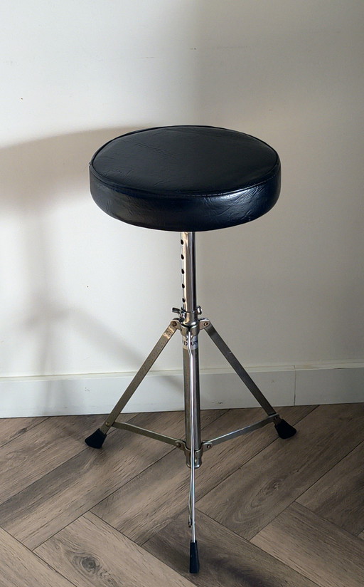 Vintage adjustable Canon stool