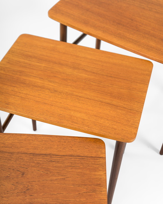 Image 1 of Mid Century Danish Nesting Tables Made Of Teak And Rattan