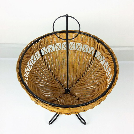 Image 1 of Vintage rattan basket on 4 black lacquered metal legs, 1950