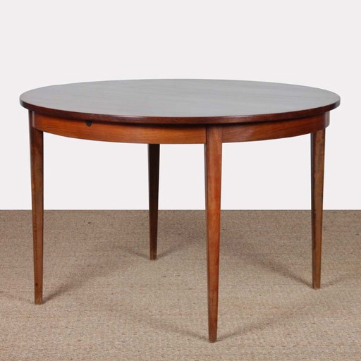 Round extendable dining table in Rio rosewood, 1960