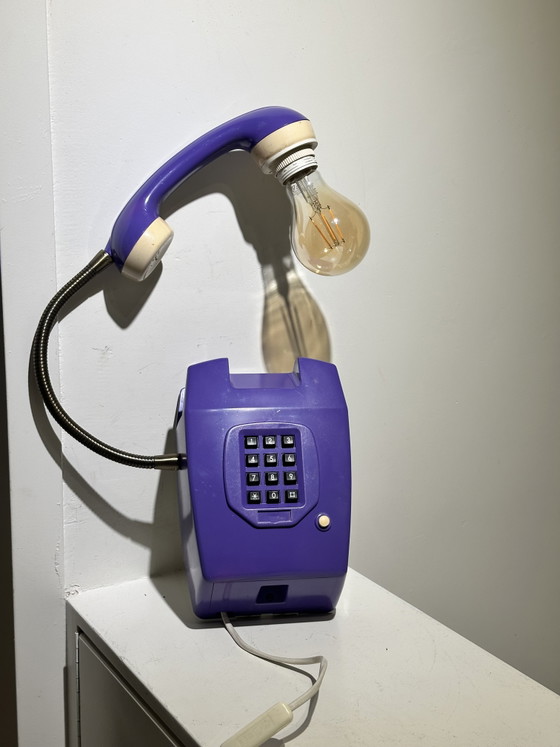 Image 1 of Vintage purple hang-up telephone
