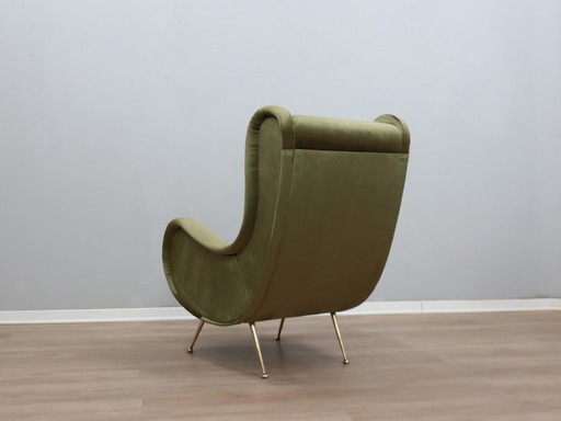 Sillón italiano de los años 50, estilo Senior Zanuso, de terciopelo verde.