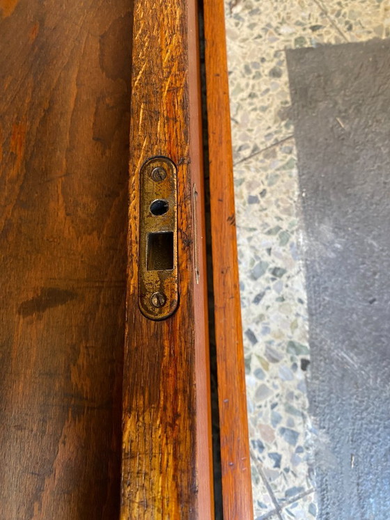 Image 1 of Antique German oak roll-top wardrobe with original key and working wooden roll-top. Made around 1920–1935