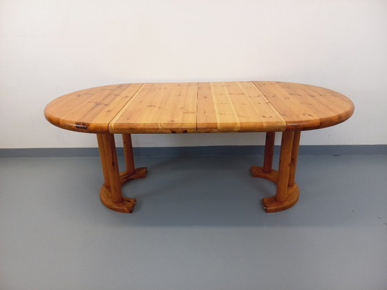 Image 1 of Vintage Scandinavian round dining table by Rainer Daumiller in pine from the 1960s/70s with extensions
