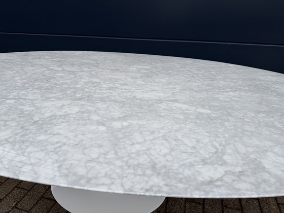 Image 1 of Original oval Knoll Tulip dining table (244cm) Carrara marble