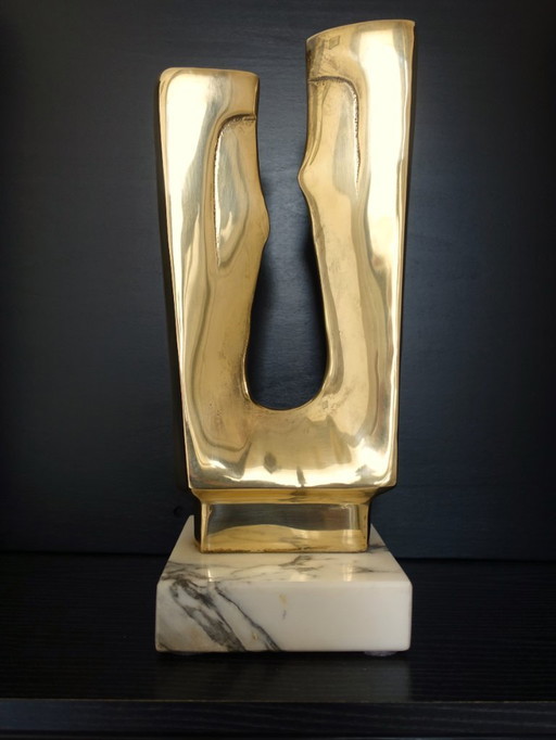 Sculpture en laiton poli d'après Gérard Koch.